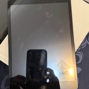 Black Tablet with Silver Trim 16gb Apple IPad mini comes with an otter box case